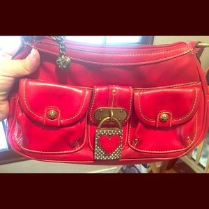 Kathy Van Zeeland red leather bag